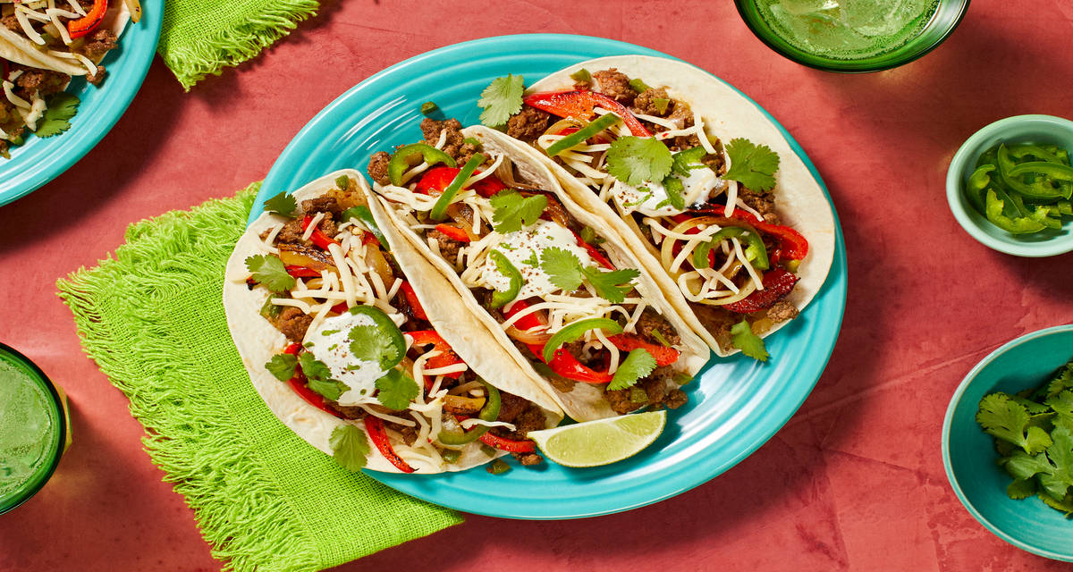 Southwestern Beef Tacos with Bell Pepper, Lime Crema, and Pepper Jack Cheese