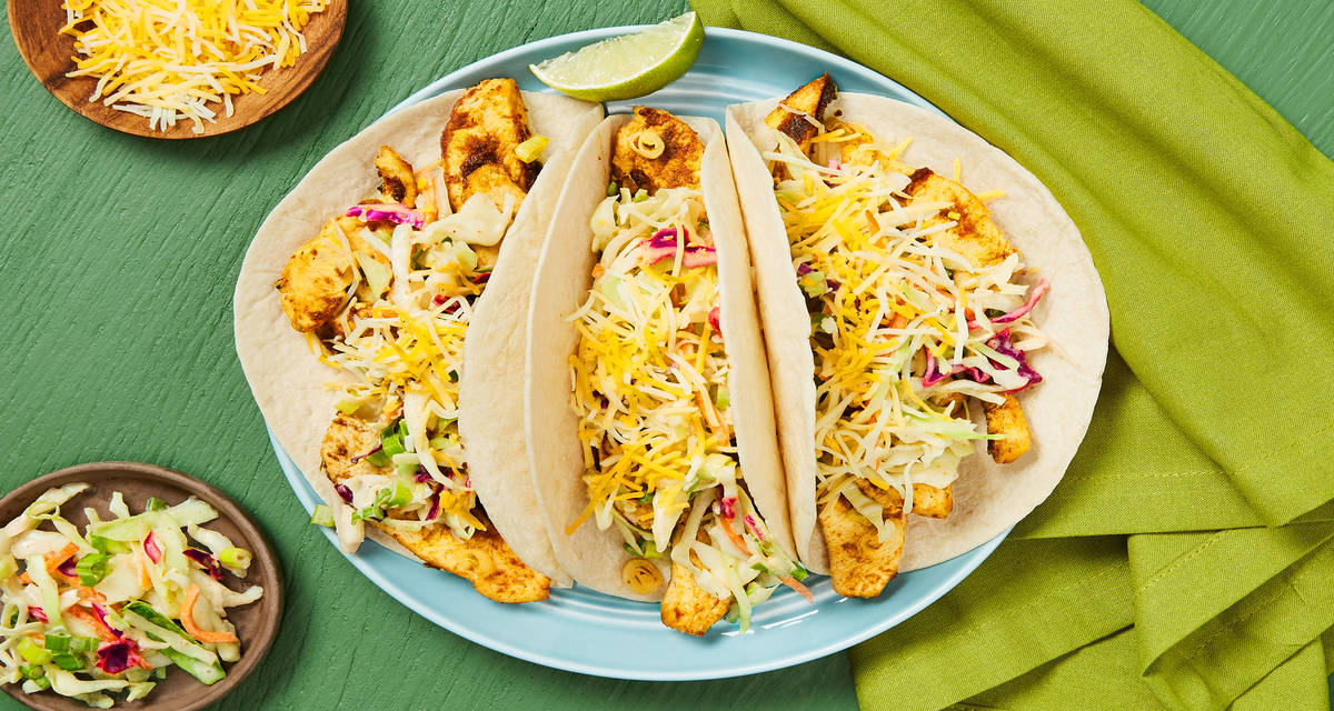 Speedy Start Chicken Tacos sprinkled with Mexican Cheese
