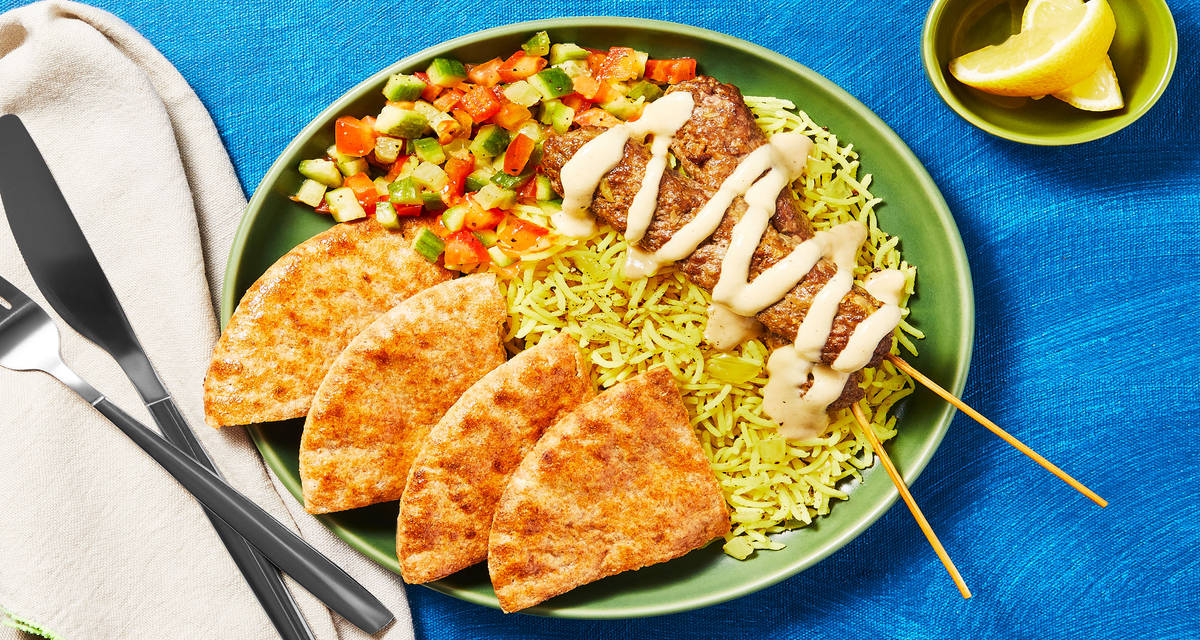 Spiced Beef Skewer Rice Bowls with Tomato Cucumber Salad, Lemony Hummus & Toasted Pitas