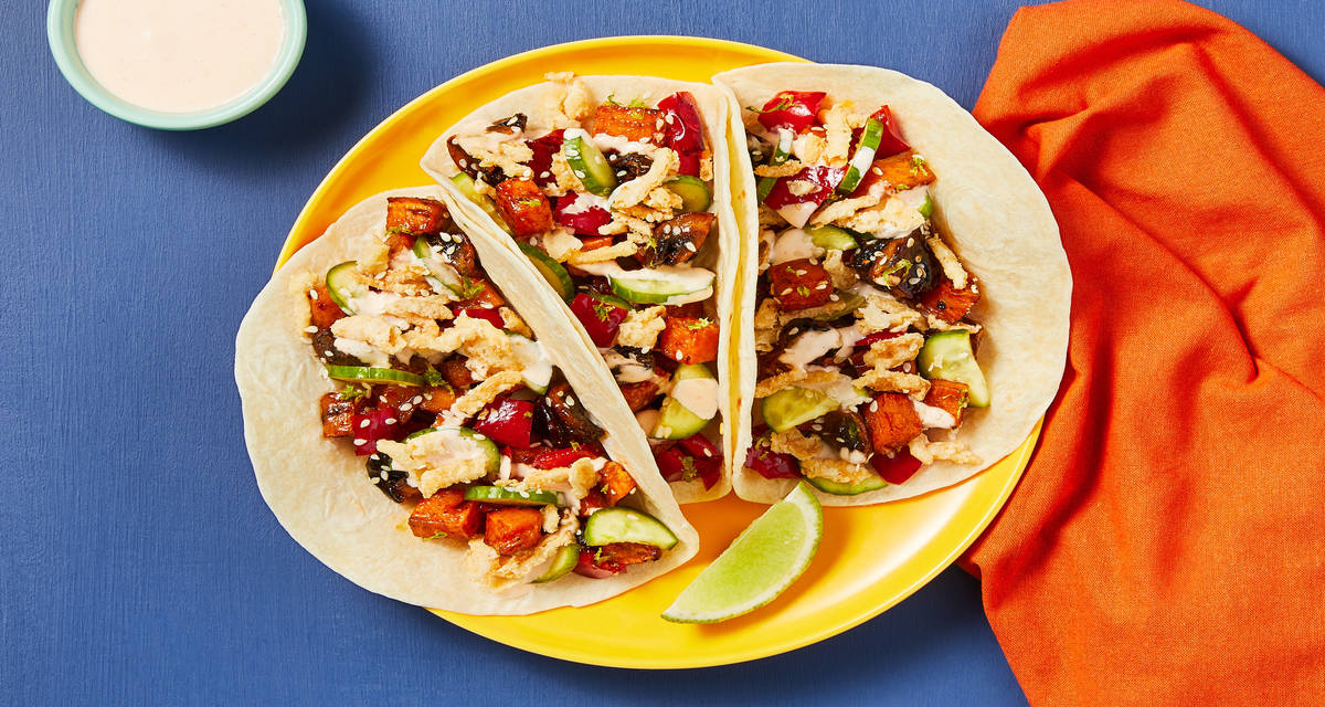 Sticky Sesame Sweet Potato Tacos with Mushrooms, Pickled Cucumbers, Creamy Sriracha Sauce & Fried Onions