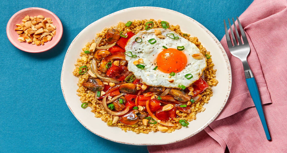 Sweet & Spicy Szechuan Veggie Stir-Fry with Ginger Bulgur & a Fried Egg