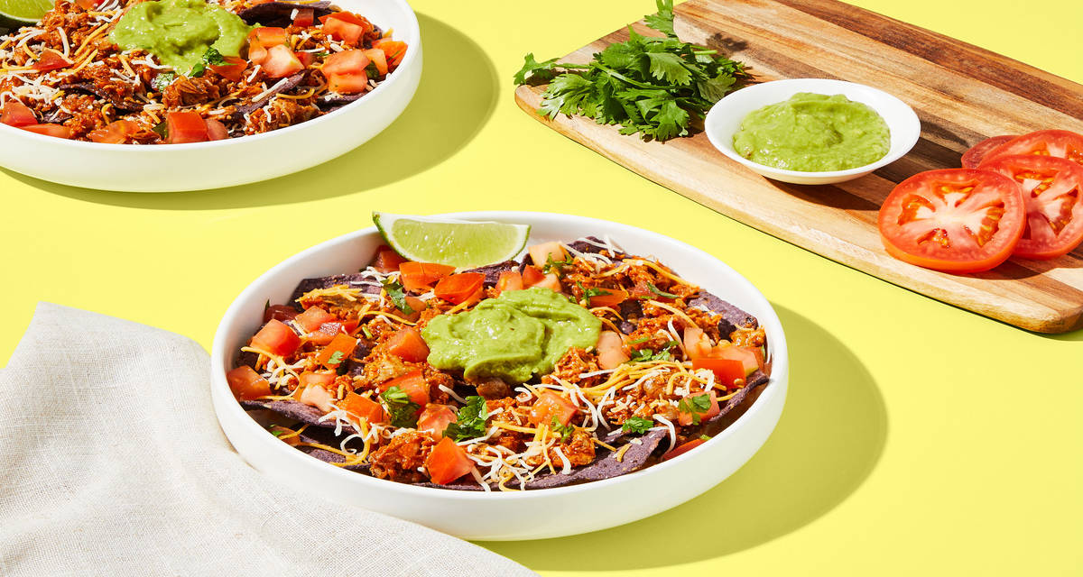 Tex-Mex Pulled Pork Nachos with Mexican Cheese Blend, Pico de Gallo & Guacamole