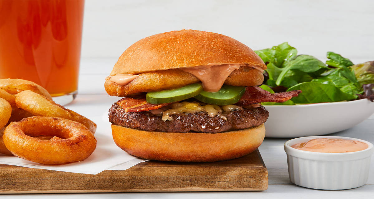 The Boss Burger with Homemade Onion Rings, Bacon & Lemony Mixed Greens
