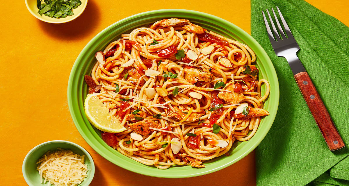 Top Tomato Spaghetti with Chicken with Toasted Almonds, Parmesan & Parsley