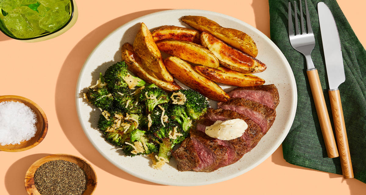 Truffle Butter Steaks potato wedges, Parmesan roasted broccoli