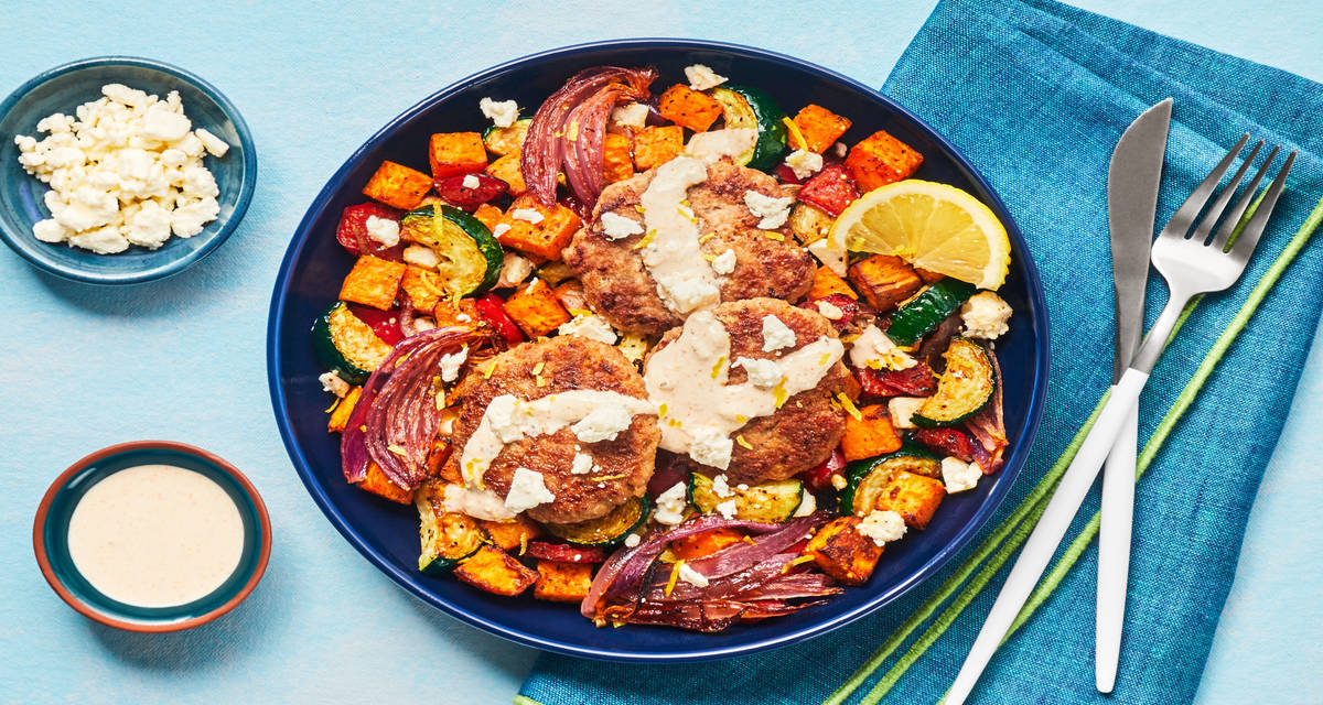 Turkey Patties with Smoky Lemon Crema over a Bed of Roasted Veg