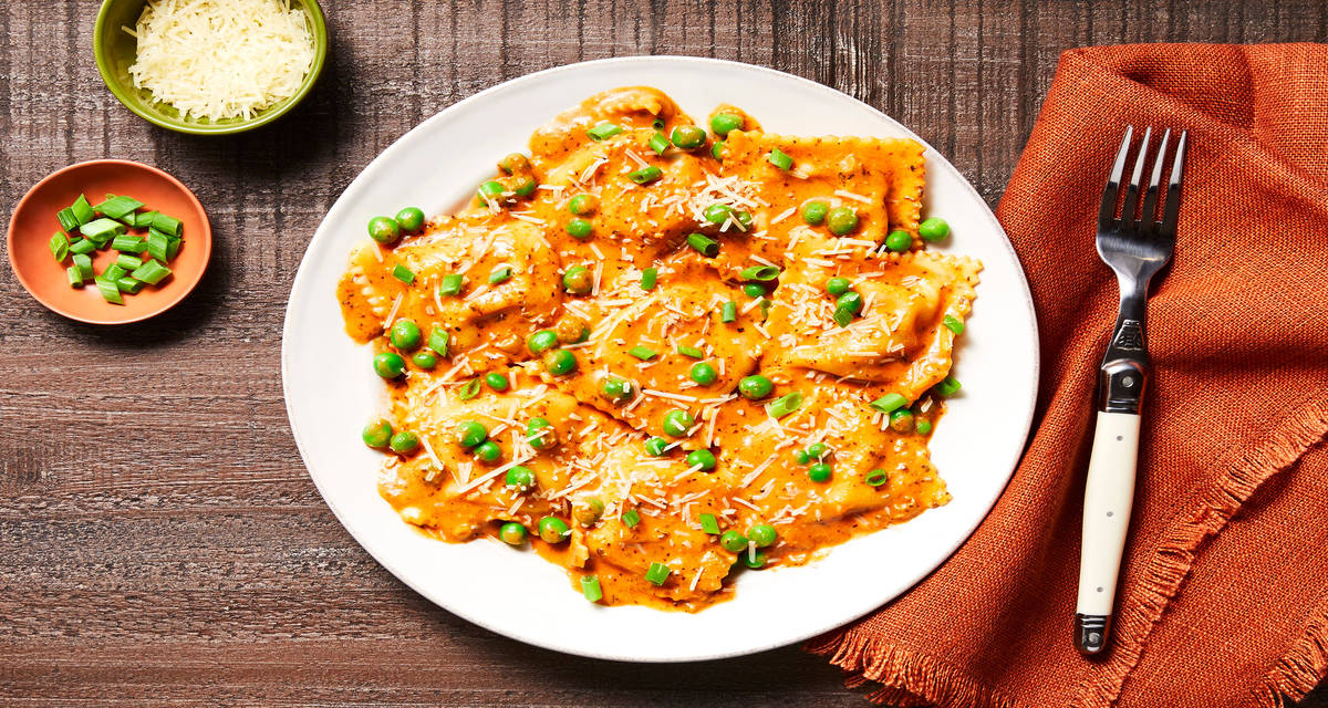 Tuscan Chicken & Bacon Filled Ravioli with Peas & a Tomato Parmesan Cream Sauce