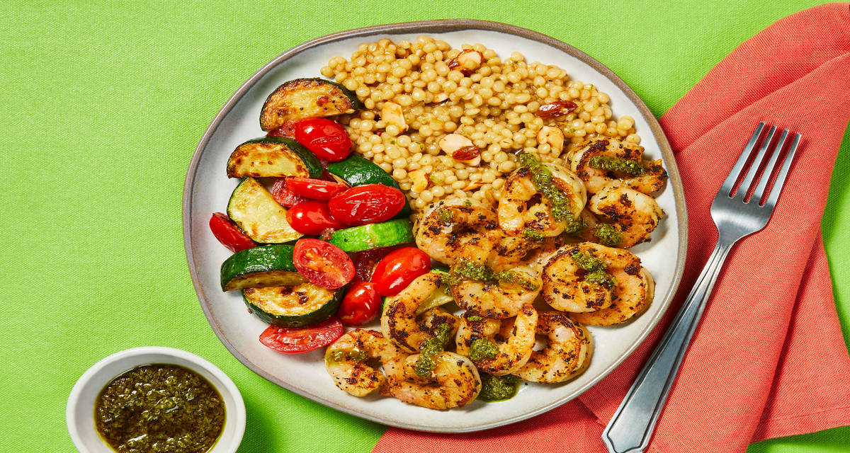 Tuscan-Spiced Shrimp with Pesto Couscous, Blistered Grape Tomatoes & Zucchini