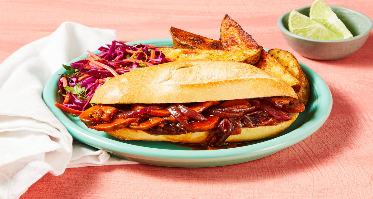 Vegan Smoky BBQ Mushroom Sloppy Joes with Cilantro Lime Slaw, Potato Wedges & Hot Sauce