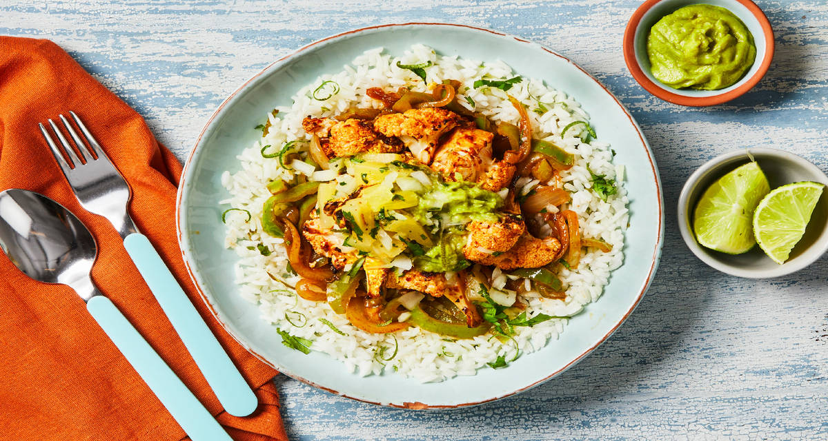 Vegan Spicy Tex-Mex Cauliflower Bowls with Fajita Veggies, Guacamole & Pineapple Salsa
