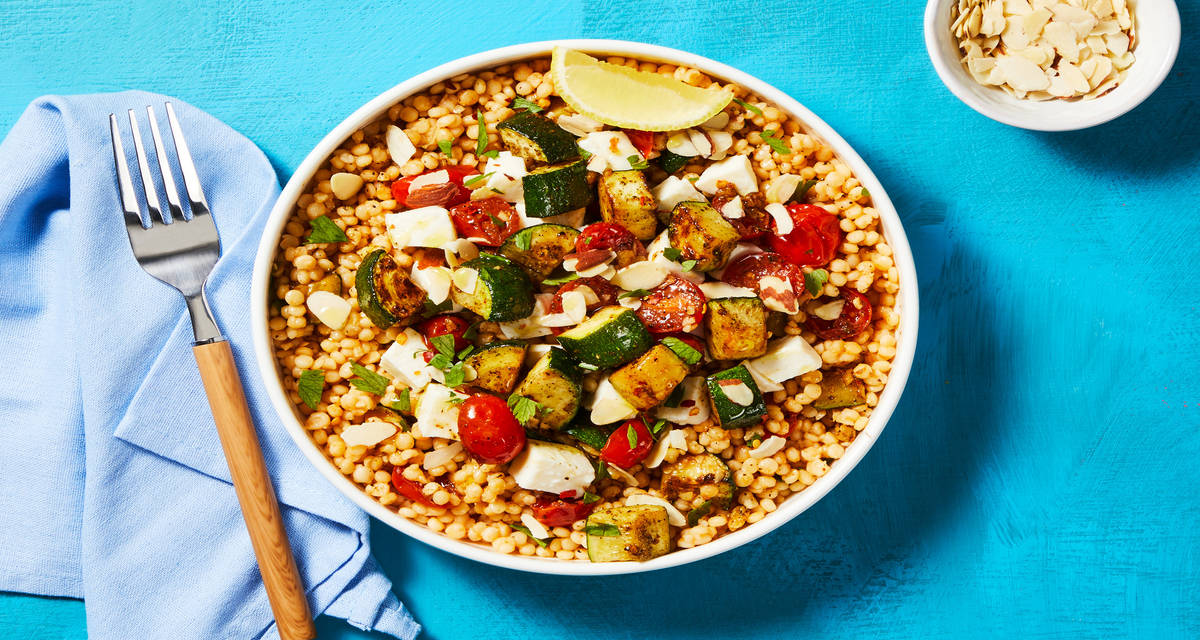 Zucchini & Tomato Couscous Bowls with Fresh Mozz, Parsley, Chili Flakes & Almonds