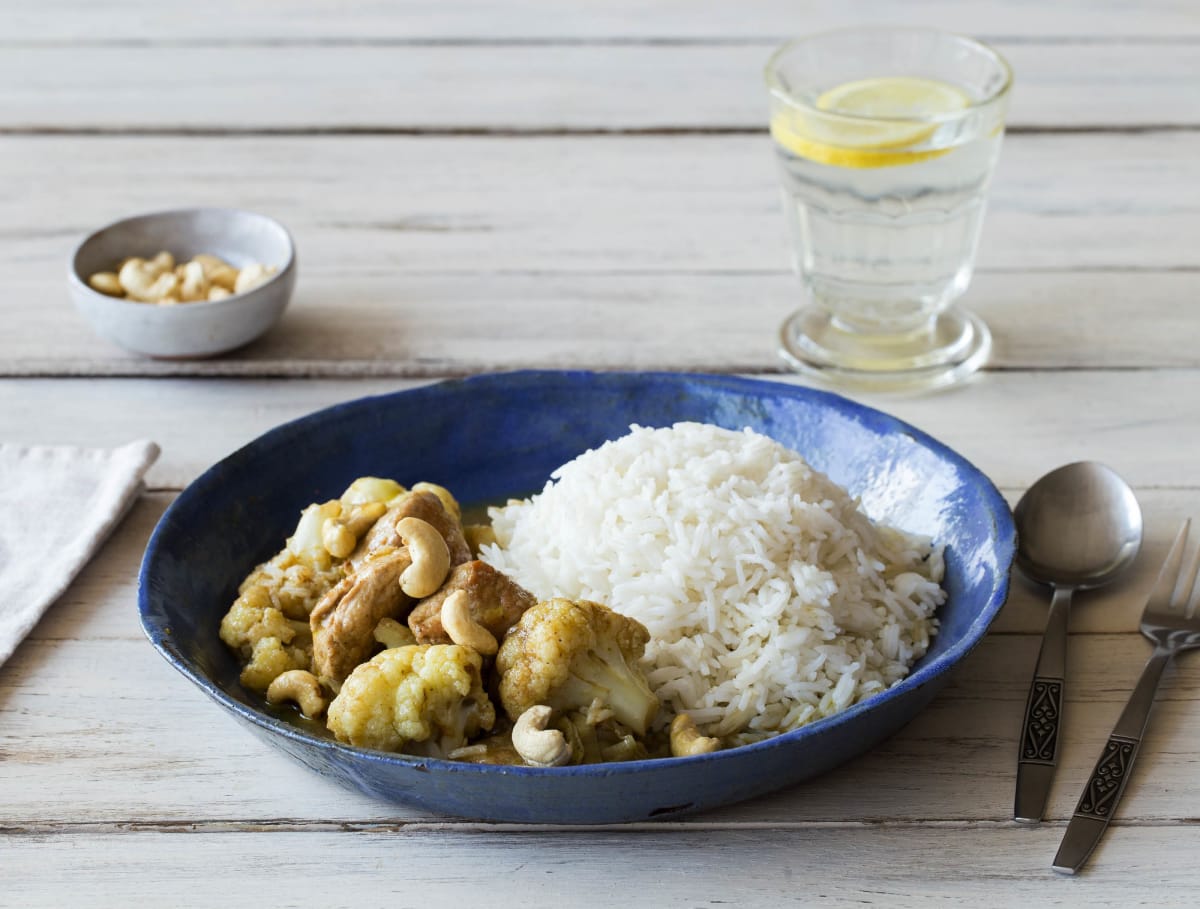 Groene curry met varkenshaasblokjes en cashewnoten