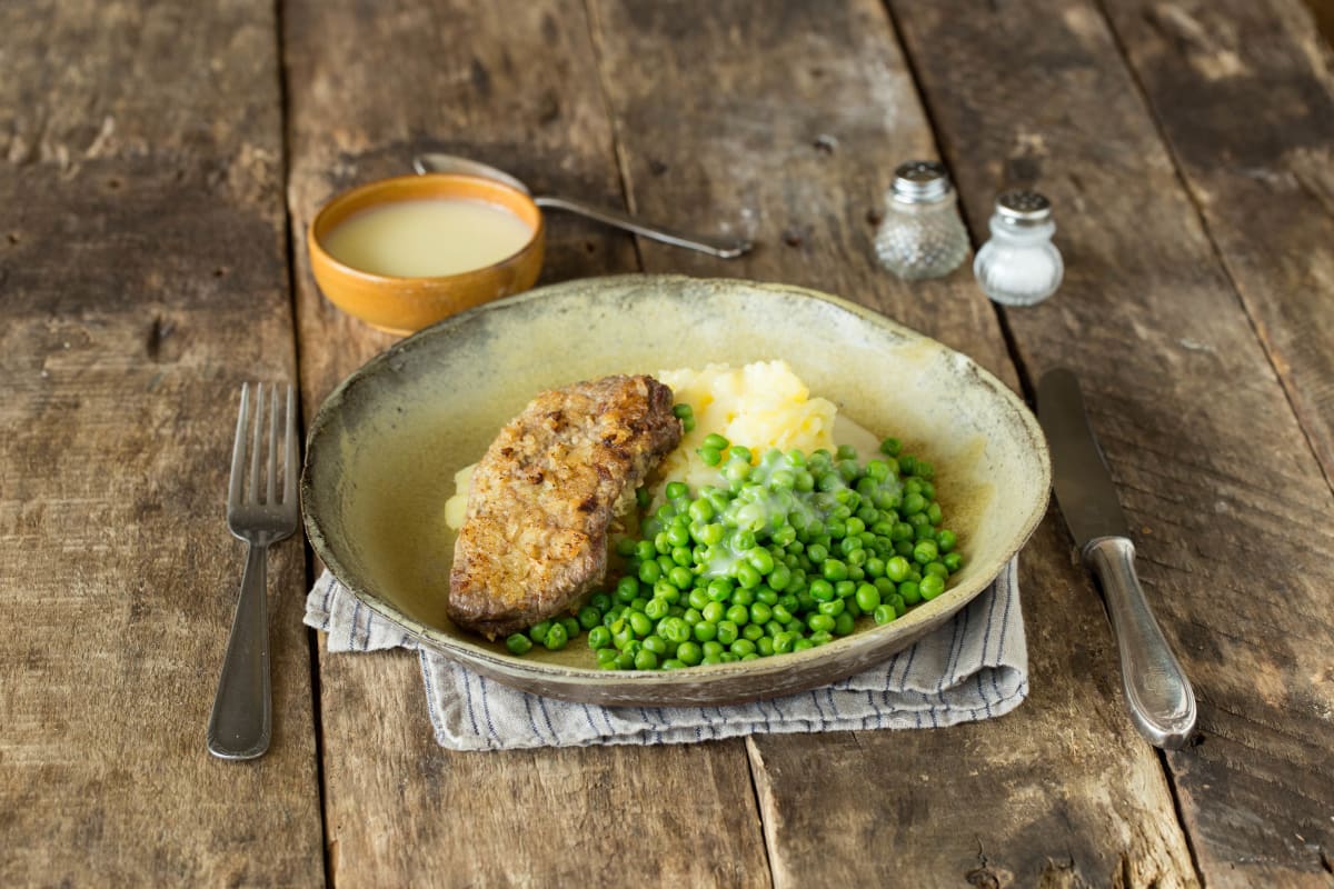 Homestyle Chicken Fried Steak with Mashed Potatoes, Peas, and Gravy