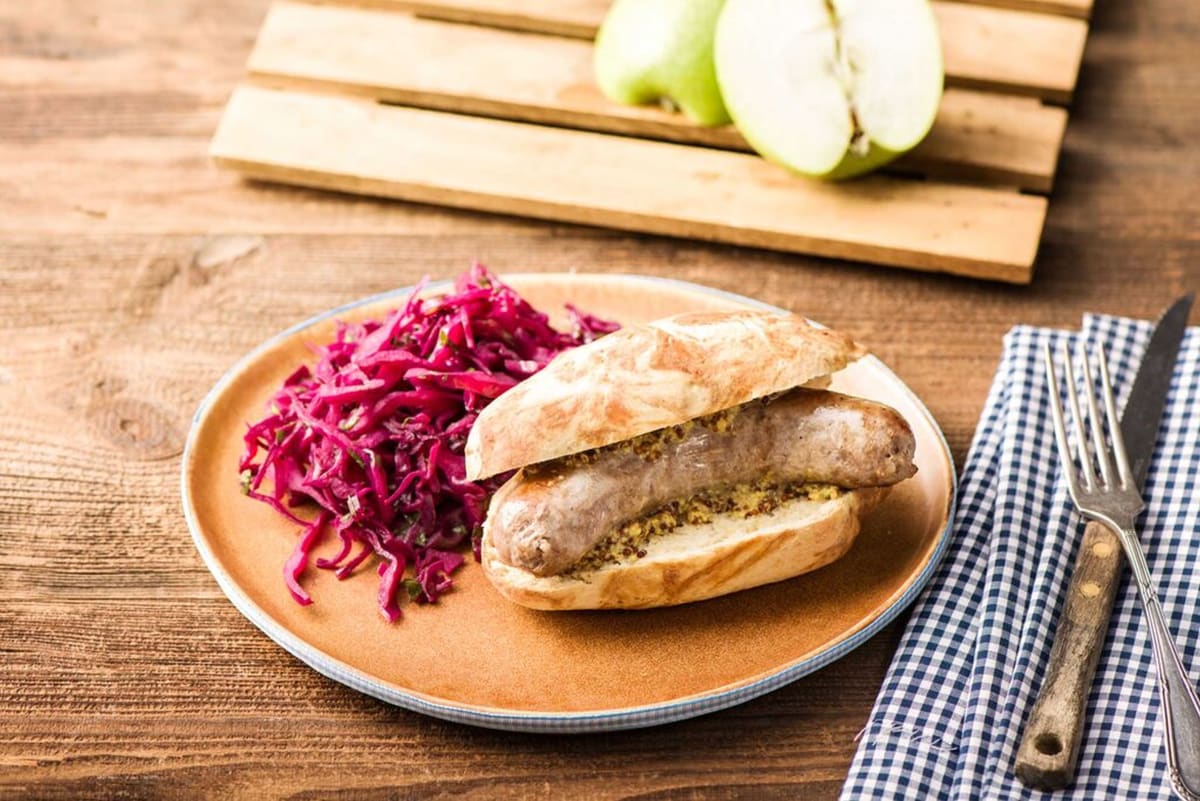 Pretzel Bun Bratwursts with Tangy Apple-Cabbage Slaw
