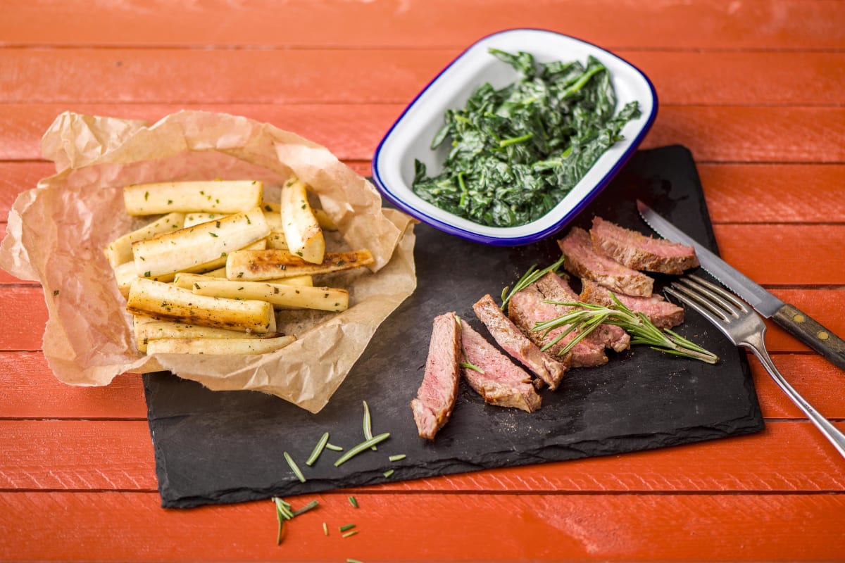Rosemary-Basted Steak with Roasted Parsnip Wedges and Garlicky Creamed Spinach