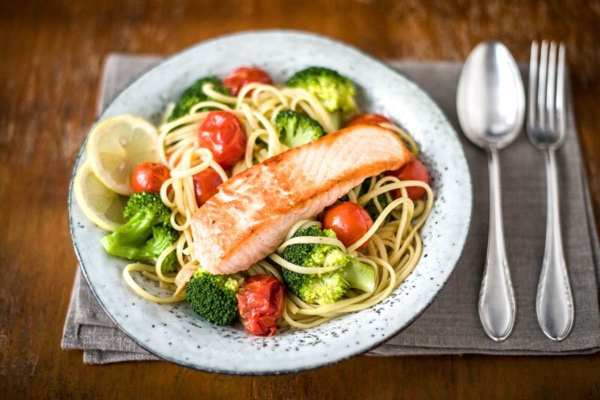 Lemony Salmon & Cacio e Pepe Linguine with Crispy Broccoli, Burst Tomatoes, and Chilies