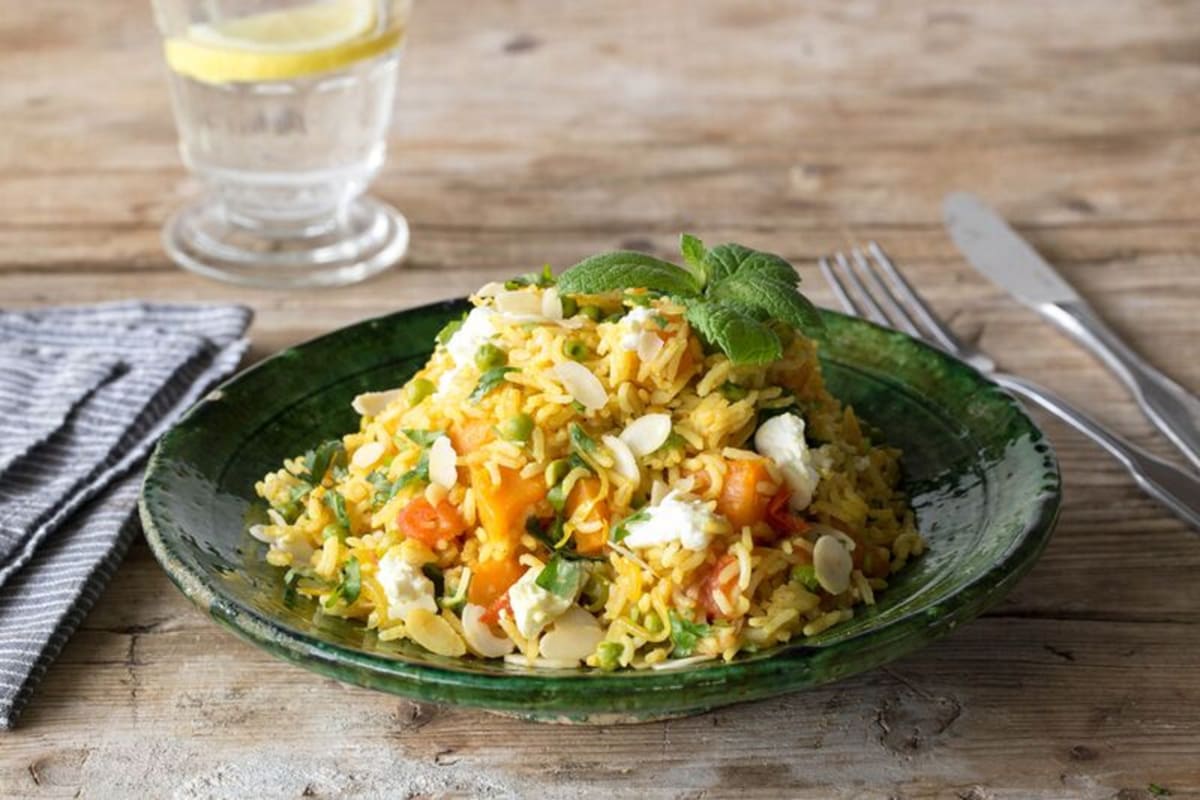 Curried Veggie Biryani with Sweet Potato, Peas, and Herbs