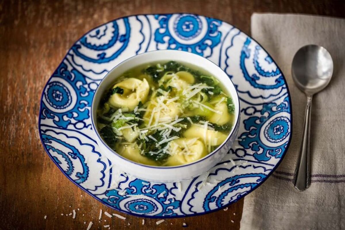 Tortellini En Brodo with Shredded Brussels Sprouts, Kale, and Parmesan