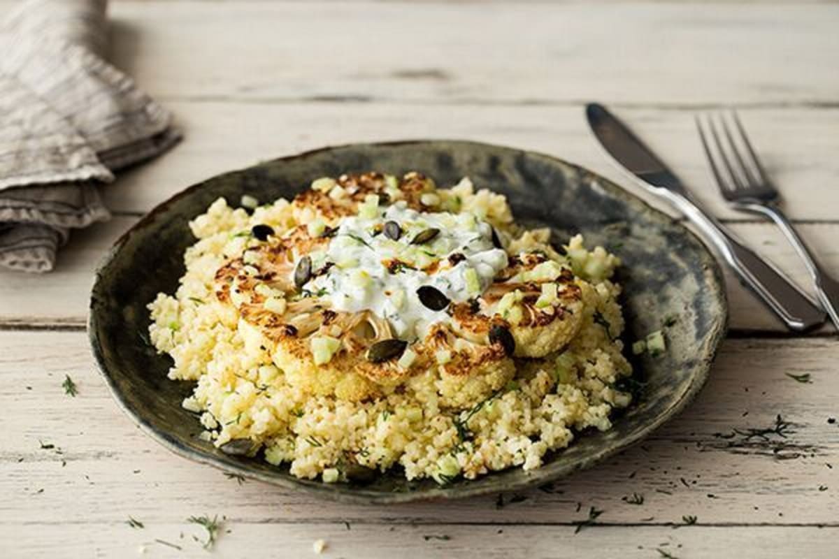 Roasted Cauliflower Steaks with Bulgur, Tzatziki, and Spiced Oil