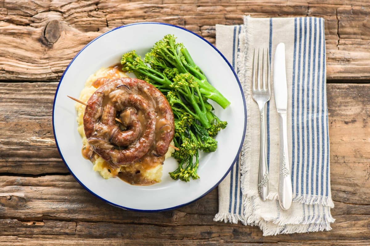 Curly Sausage, Celeriac Mash and Sticky Onion Gravy