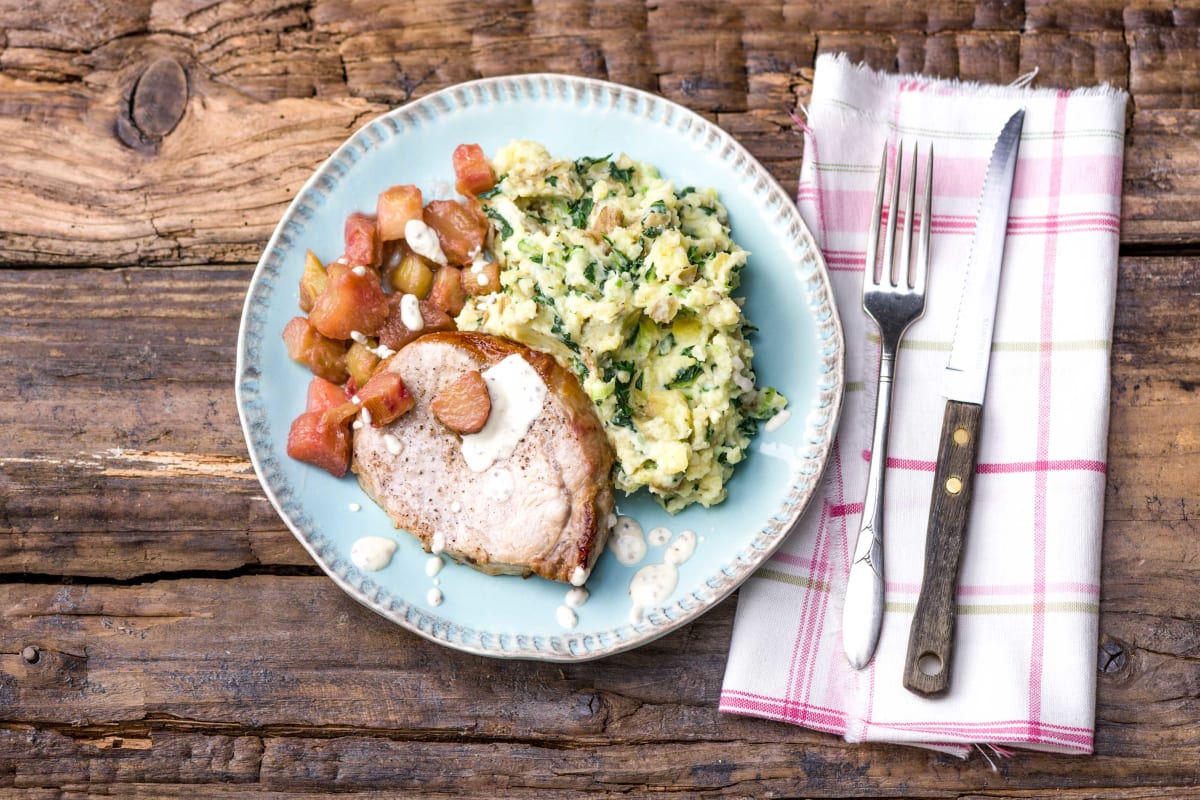 Grilled pork chops, champ potatoes, and glazed rhubarb