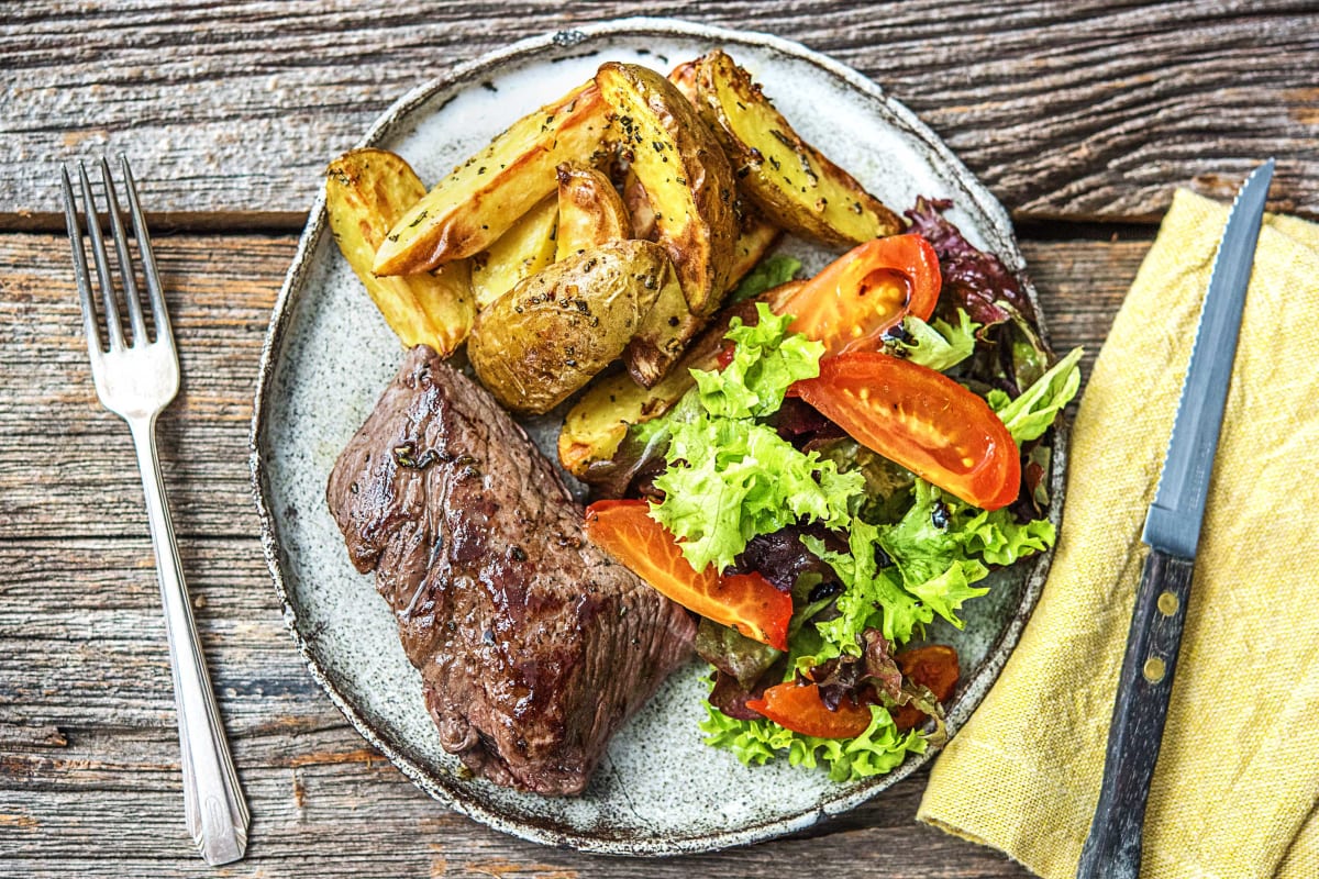 Rumpsteak mit geschmorten Tomaten,