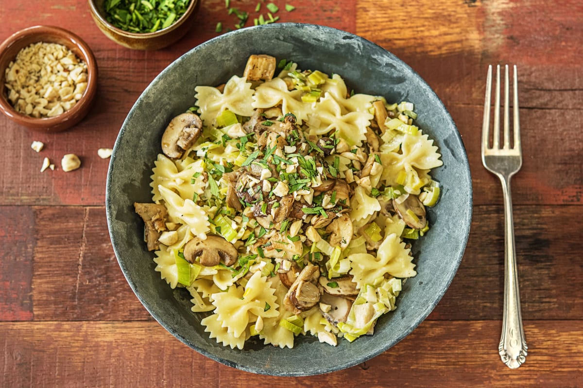 Farfalle in romige paddenstoelensaus