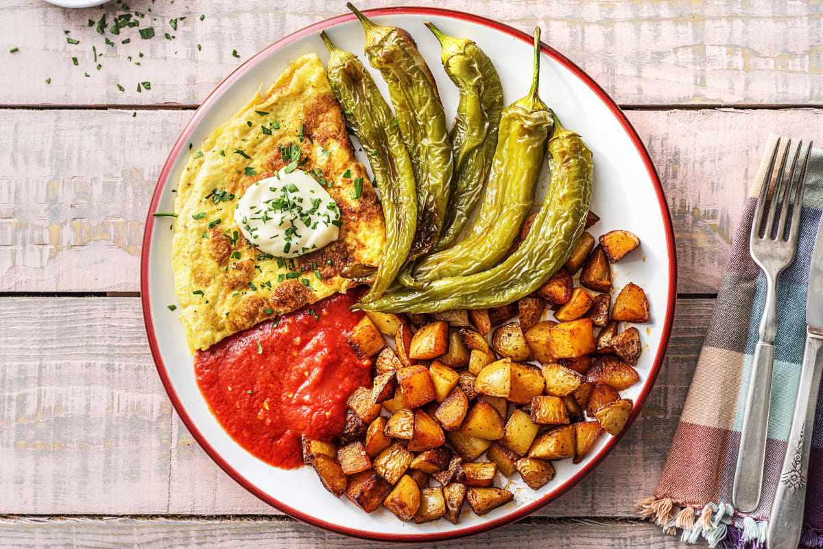 Patatas bravas et omelette au fromage de chèvre