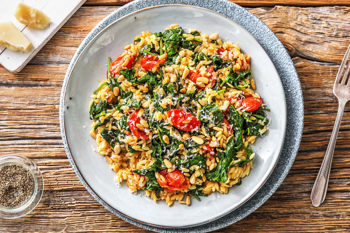 Orzo met spinazie en cherrytomaten