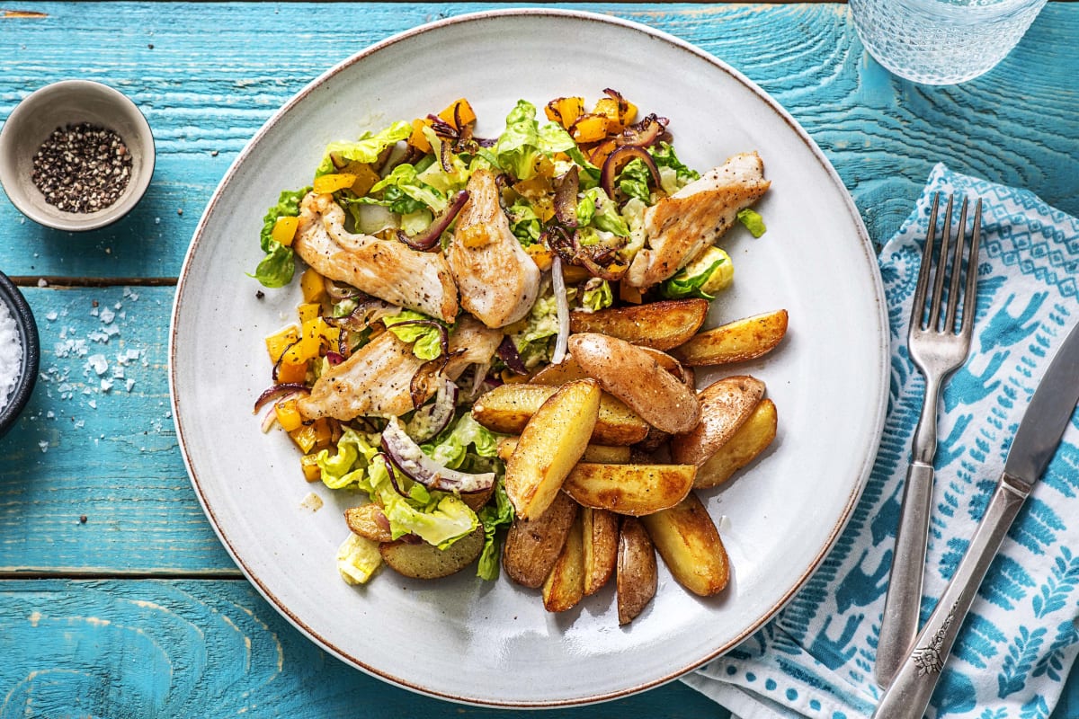 Kipfilethaasjes met kleurrijke salade