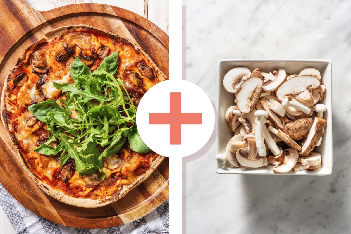 Platbroodpizza funghi met extra paddenstoelen