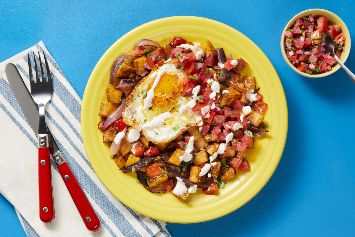 Cheesy Fried Eggs over Nacho Potato Hash