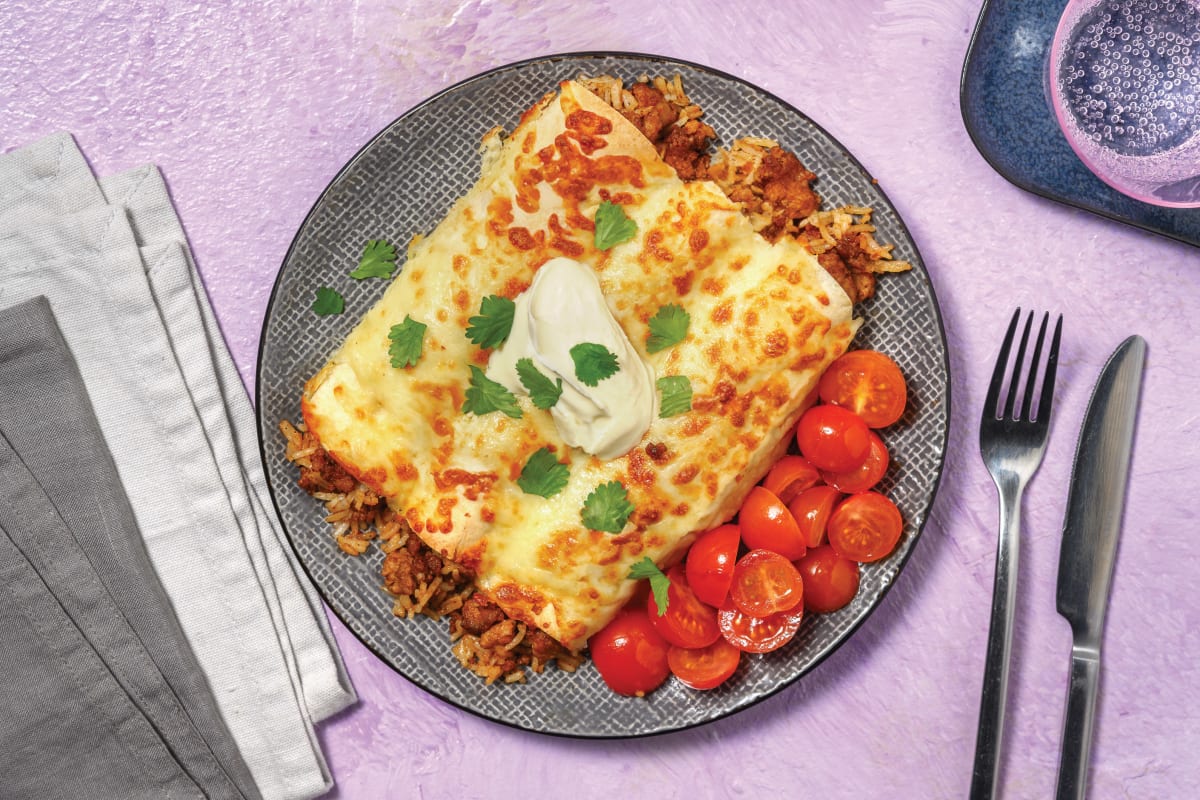 Cheesy Pork & Rice Enchiladas