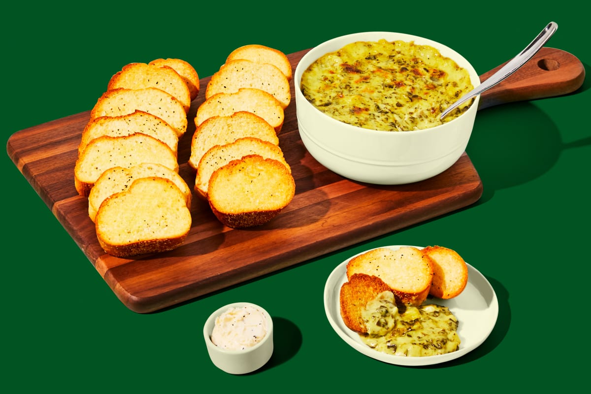 Black Truffle Spinach Artichoke Dip with Toasted Baguette