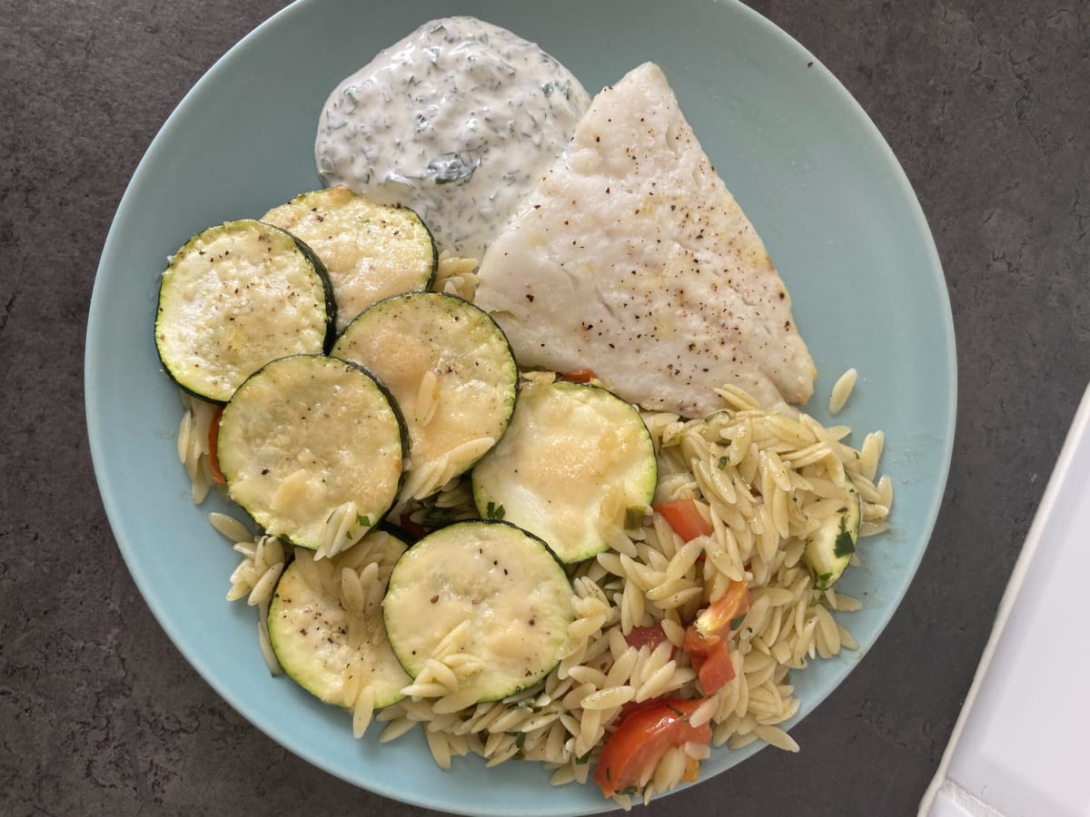 Roasted cod with baked orzo