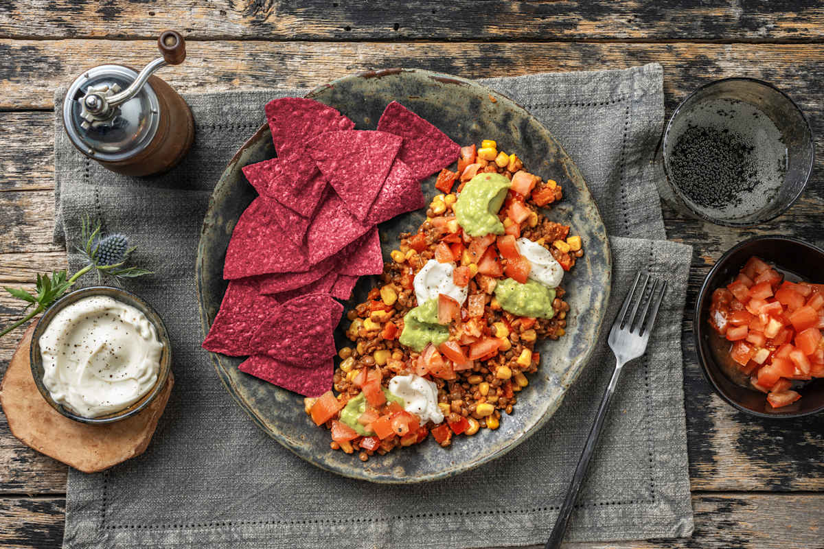 Spicy linzen met bietentortillachips