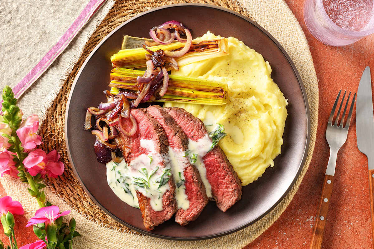 Steak met romige dragonsaus en geroosterde prei