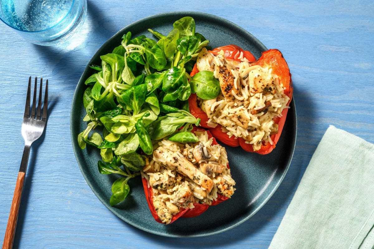 Gevulde paprika met romige champignons, kip en rijst 