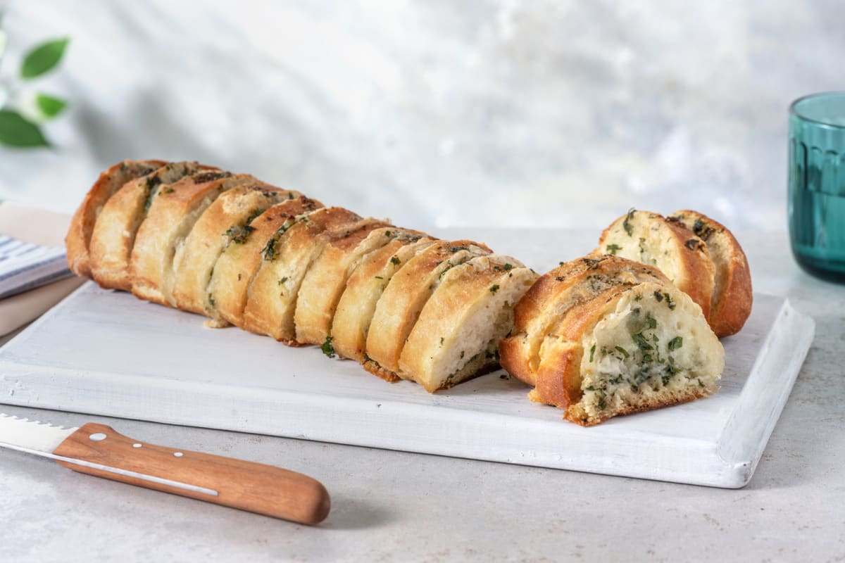 Cheesy Herby Hasselback Garlic Baguette
