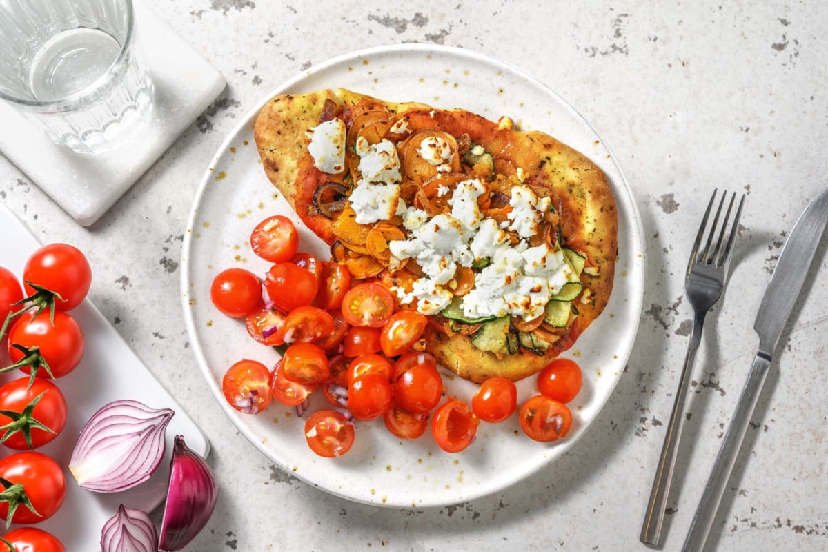 Naanpizza met geitenkaas en groenten