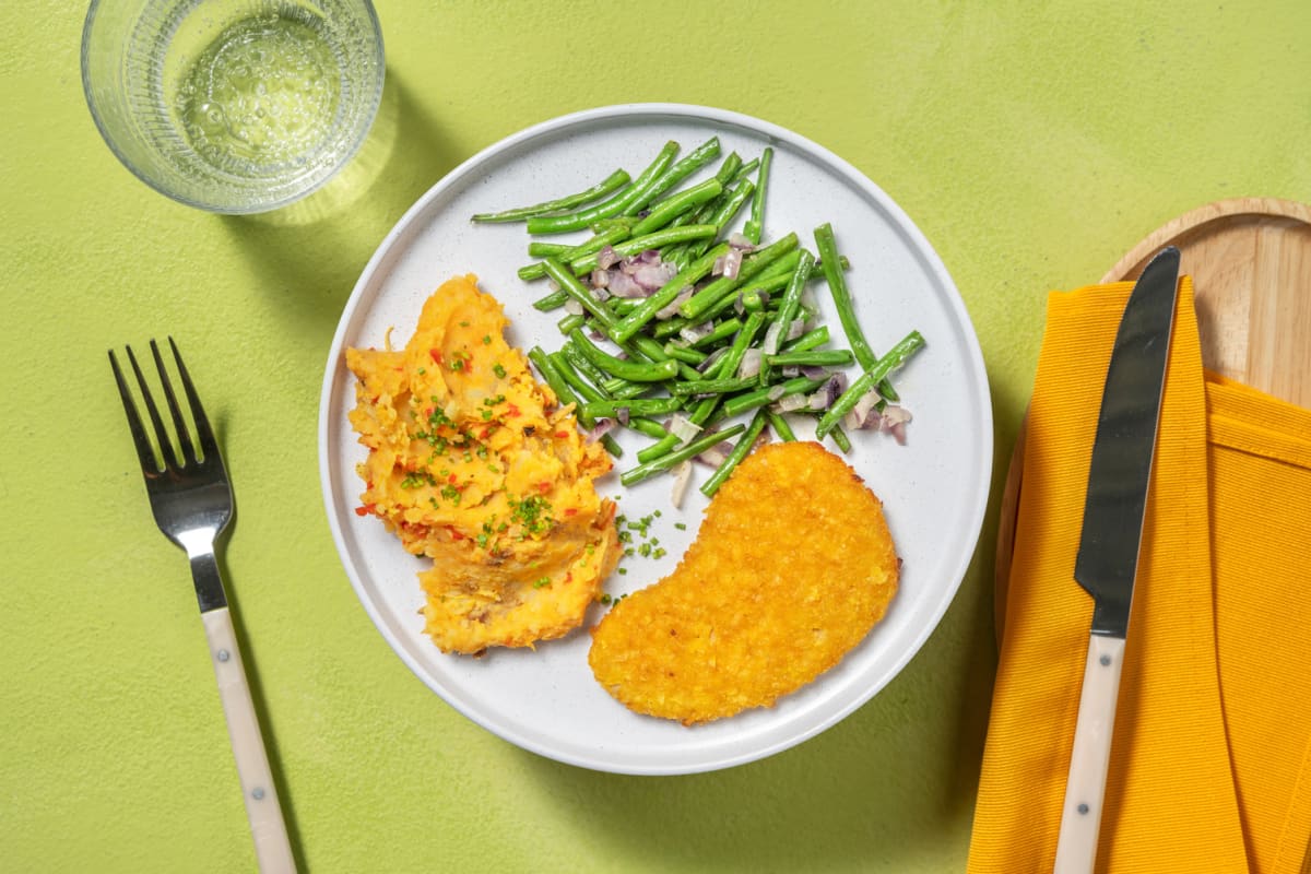 Vegetarische kaasschnitzel met pittige zoete-aardappelpuree