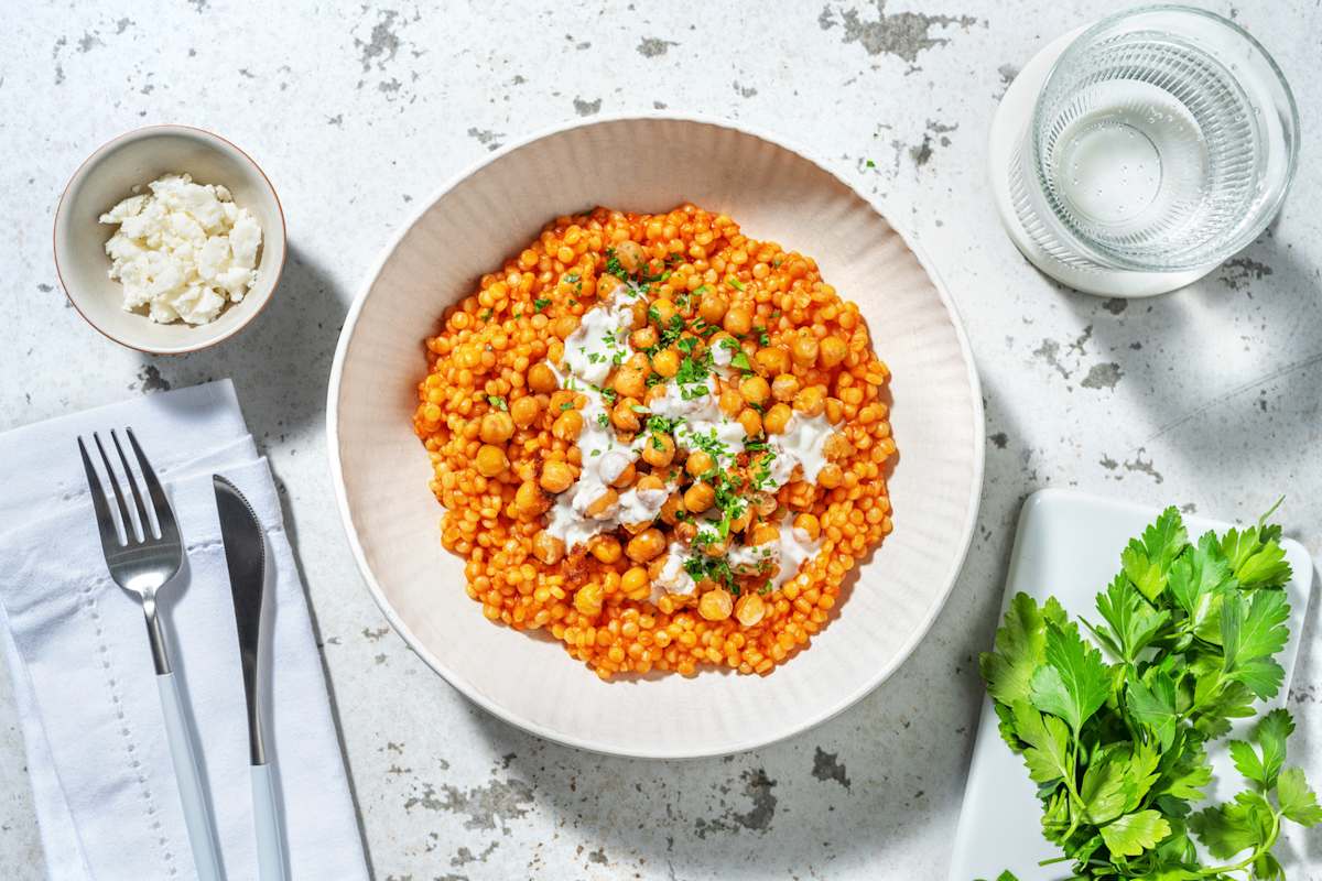 Couscous perlato, ceci speziati e caprino