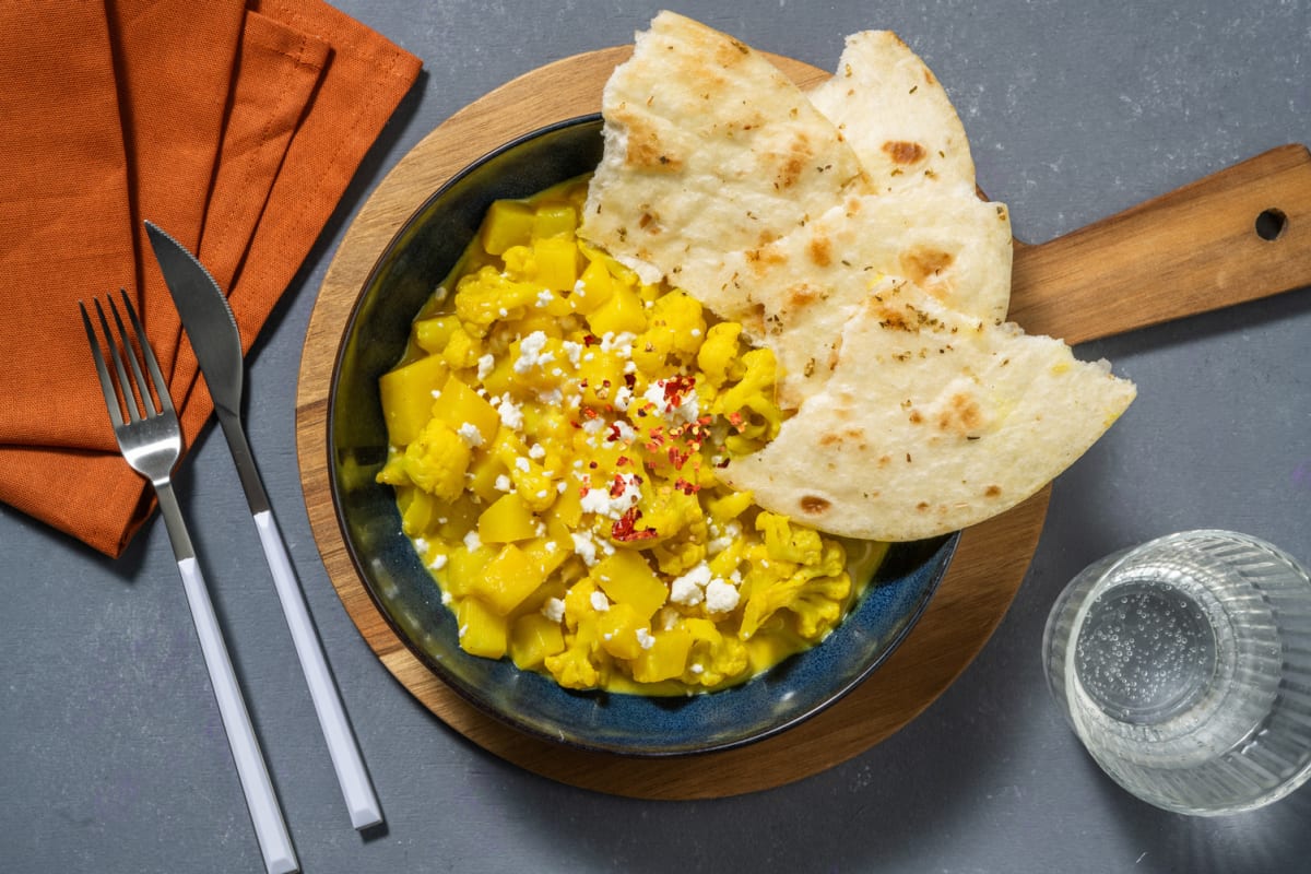 Aloo gobi di cavolfiore e formaggio greco