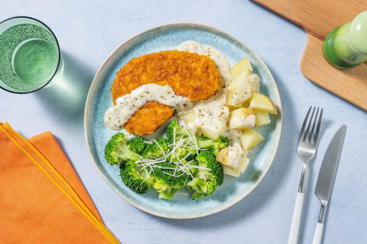 Vegetarische schnitzel met kruidige kaas-roomsaus