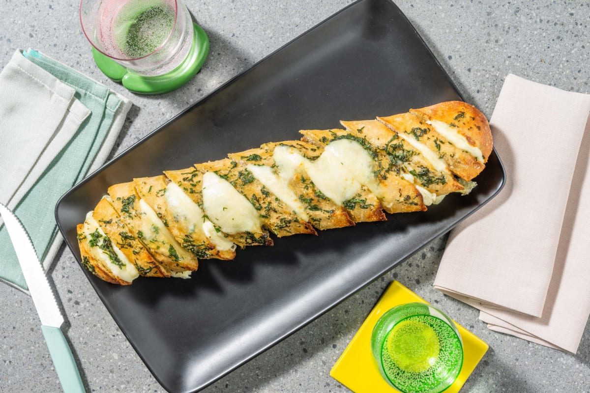 Cheesy Herby Hasselback Garlic Baguette