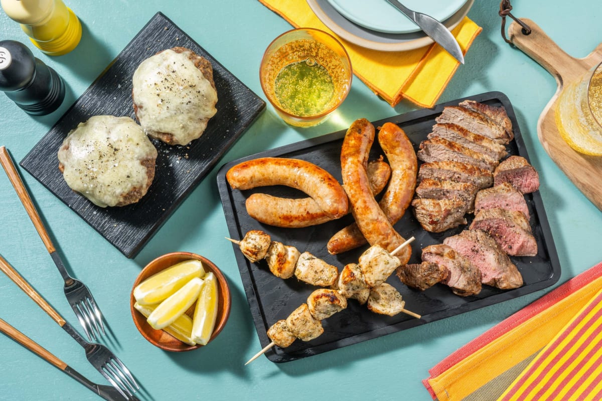 British BBQ Selection Rosemary Garlic Lamb Steaks Cumberland Sausages Cheeseburgers Zesty