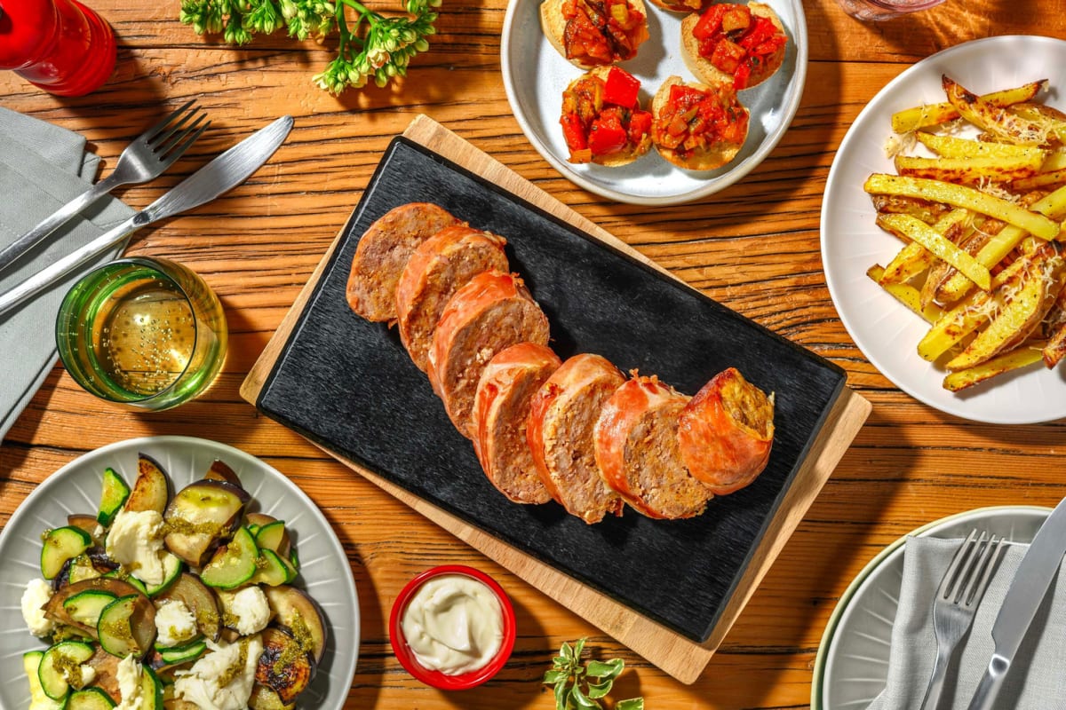 Feestelijk gehaktbrood met serranoham en caponata crostini