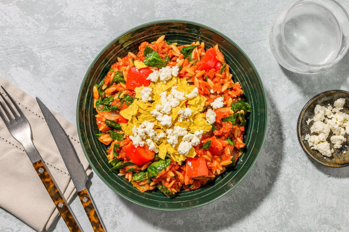 Tex Mex Beef Stew with Orzo Feta and Tortilla Crumble
