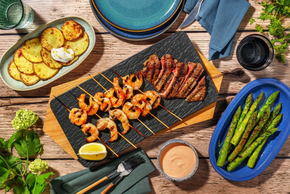 Grilled Montreal-Spiced Striploin Steak and Chipotle Shrimp Cocktail 
