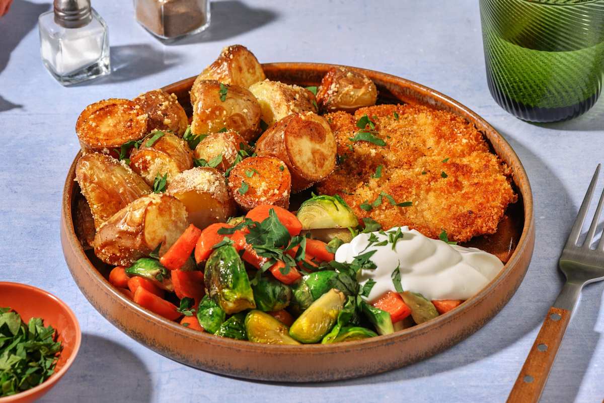 Fläskschnitzel & krispig osttoppad potatis